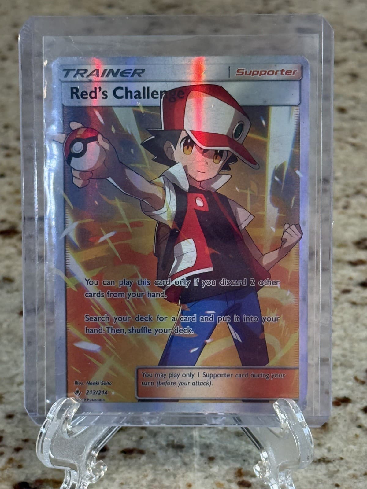 Pokemon Red's Challenge Trainer (Full Art) 213/214 Sm-Unbroken Bonds Holo