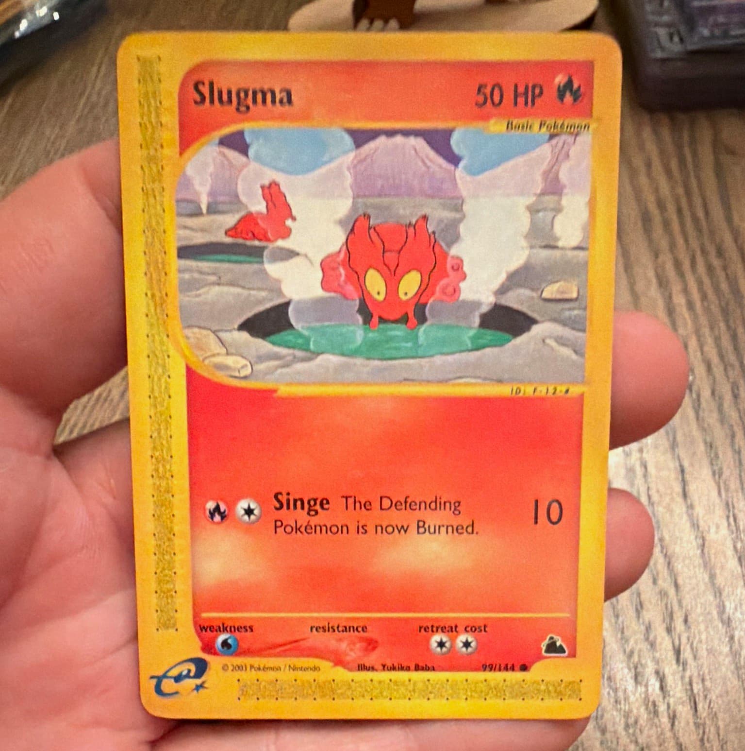The Pokémon Company Slugma 99/144 Skyridge English Regular Common Basic 50 HP