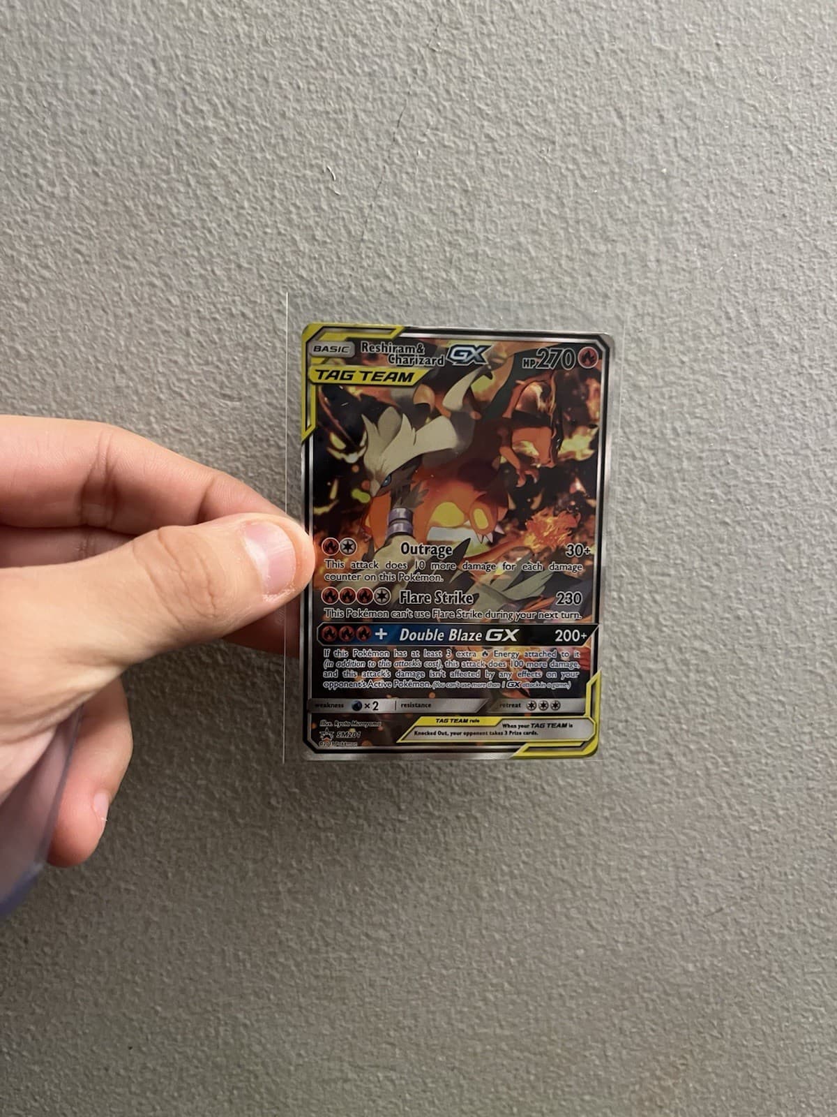 Pokémon TCG Tag Team Card Reshiram & Charizard GX Black Star Promo SM201 LP